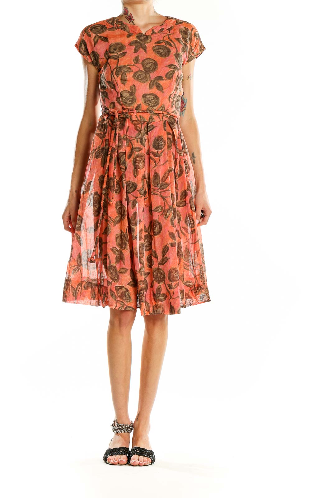 Front view of coral floral print belted dress by Jean Lang