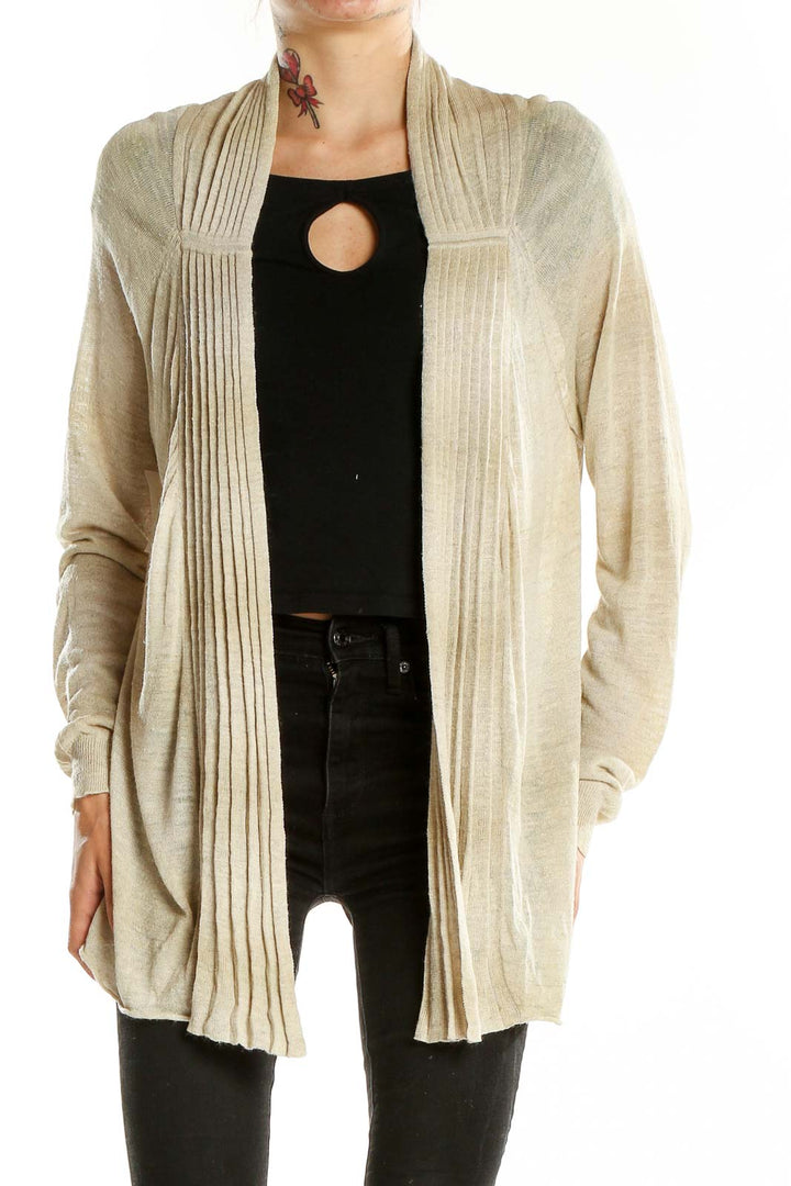 Front view of Margaret O'leary beige ribbed open front cardigan