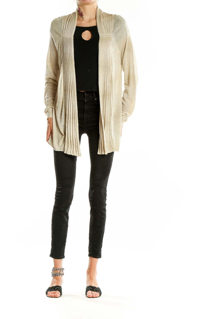 Front view of Margaret O'leary beige ribbed open front cardigan