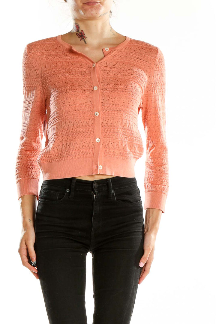 Front view of Brooks Brothers coral cotton knit cardigan with button closure