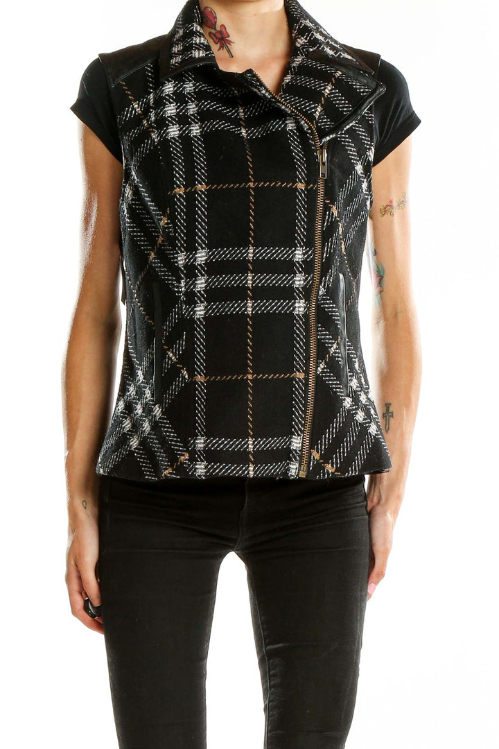 Front view of Cabi Black Plaid Asymmetrical Zip Vest on model