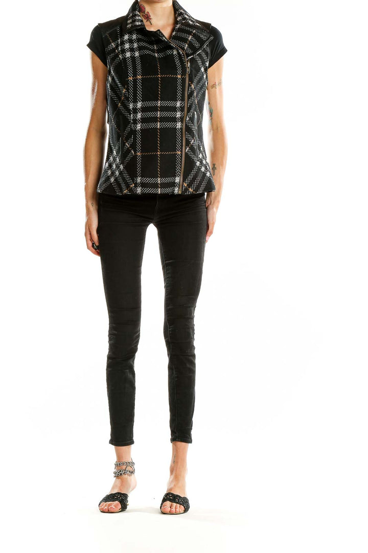 Front view of Cabi Black Plaid Asymmetrical Zip Vest on model