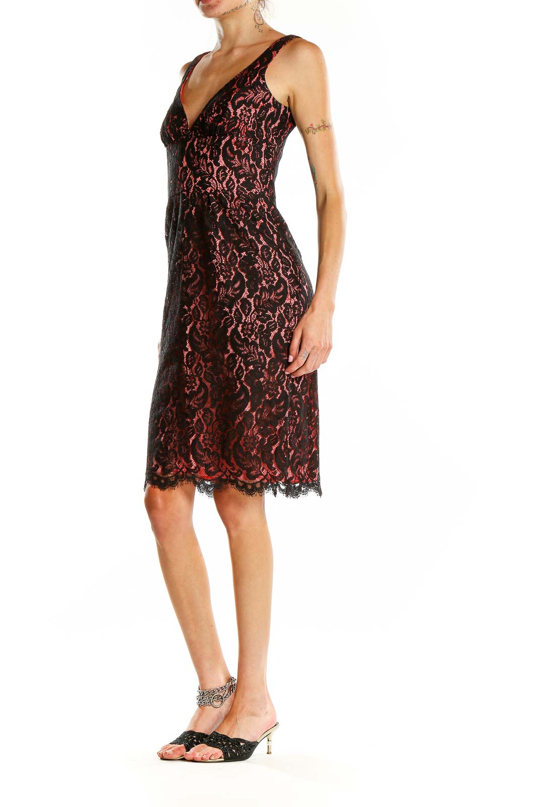 Front view of Trina Turk black and red lace cocktail dress with V-neckline