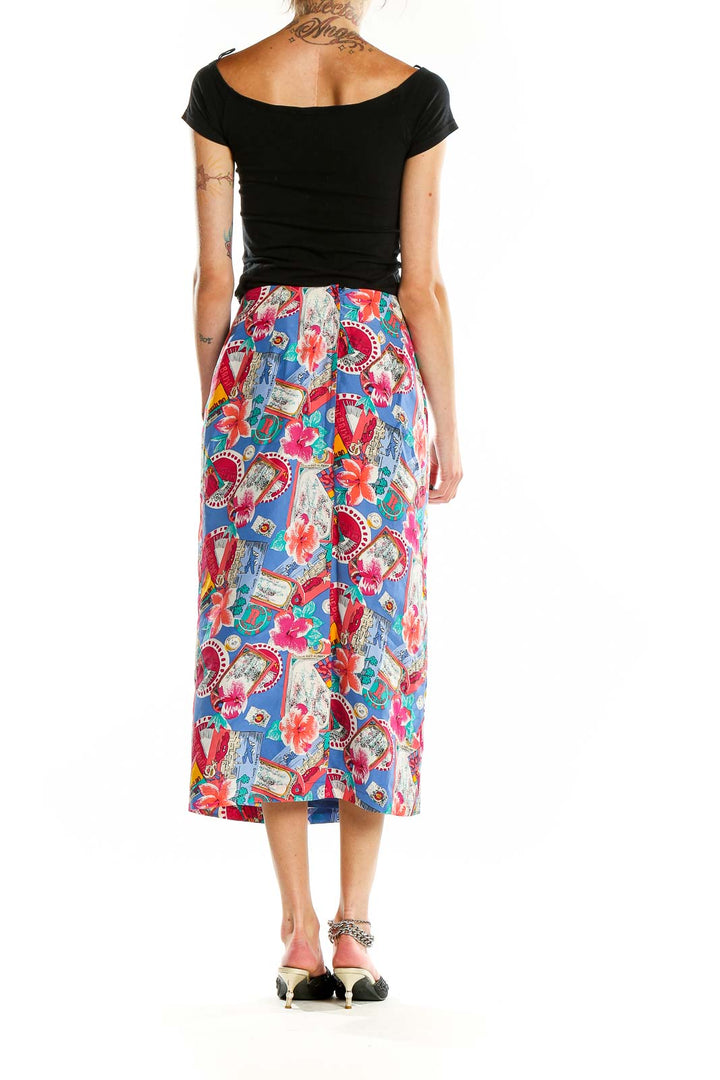 Back view of Casual Corner ANNEX blue floral print silk midi skirt on model