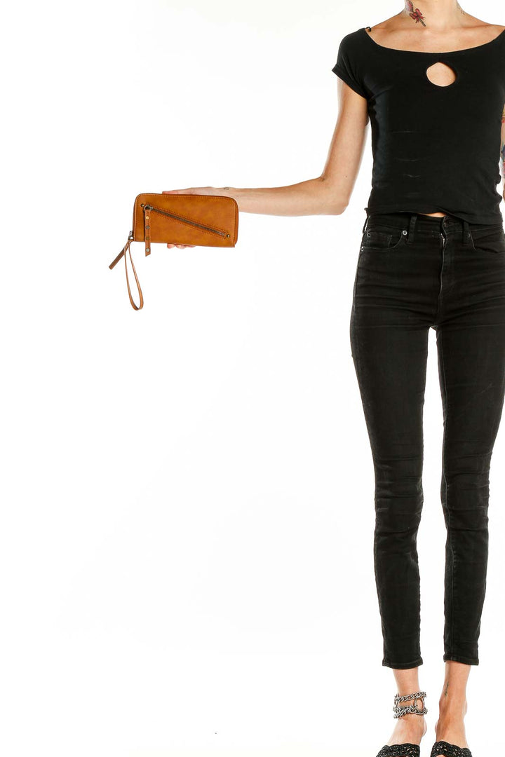 Tan vegan leather zip clutch from Free People, front view