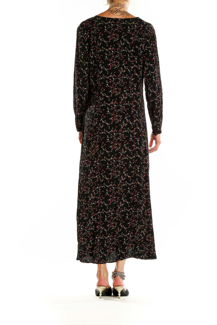 Back view of Putumayo black floral print rayon maxi dress showing full length