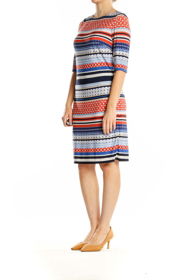 Front view of Eliza J blue and orange geometric print fitted dress