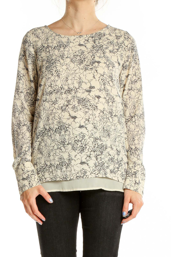 Front view of beige floral print long sleeve blouse from The Limited