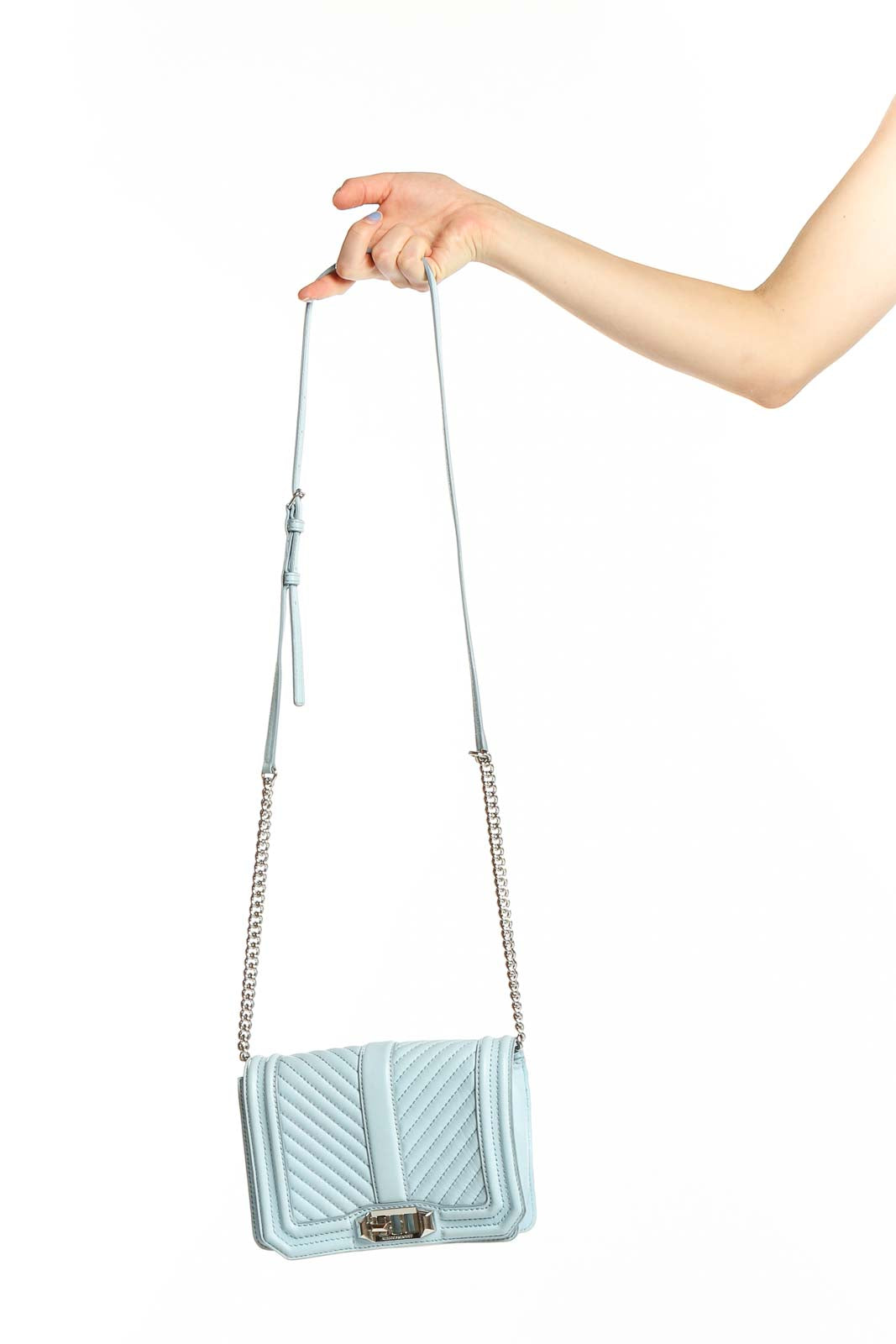 Front view of Rebecca Minkoff light blue quilted leather crossbody bag