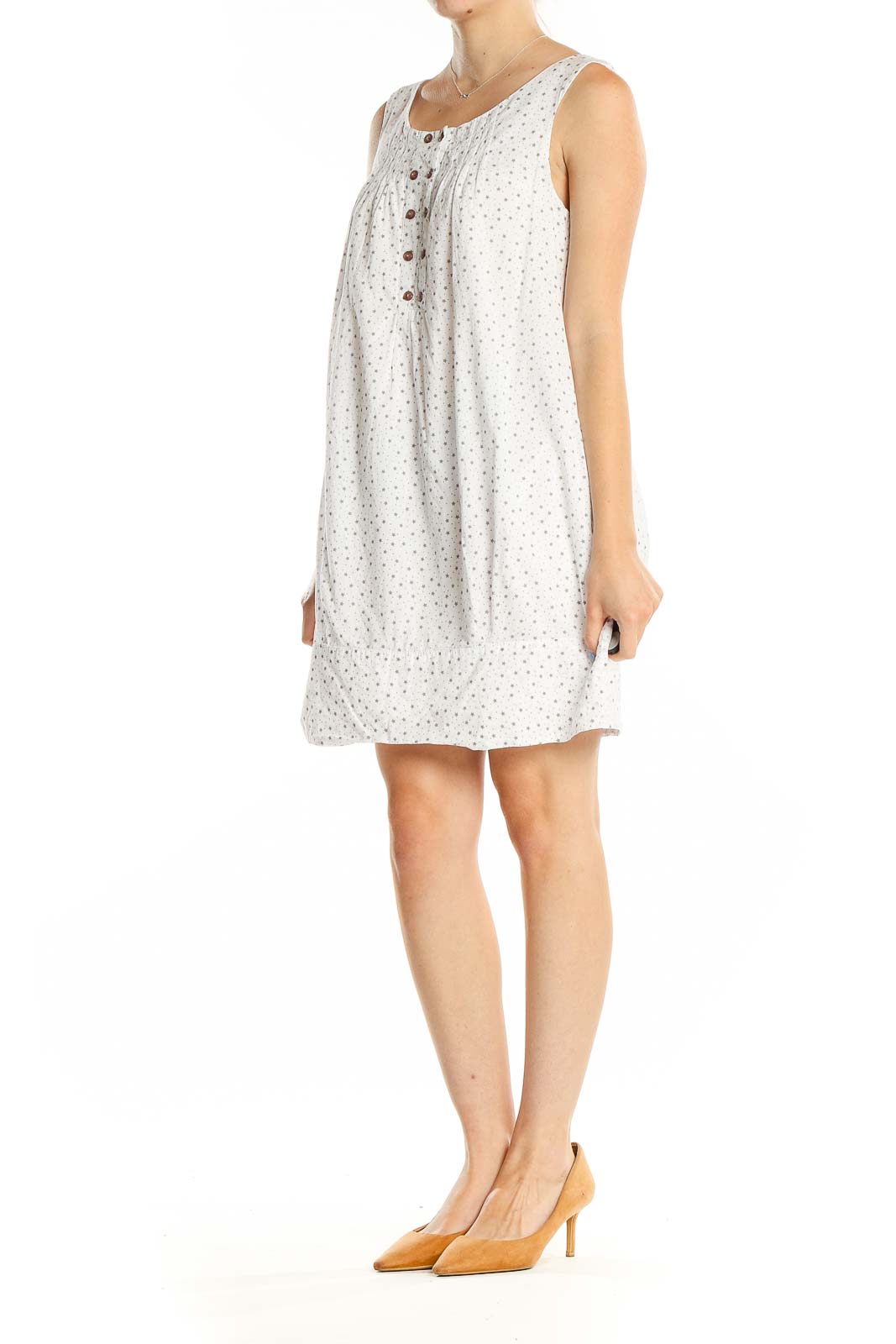 Front view of white polka dot sleeveless cotton dress by Lovestitch