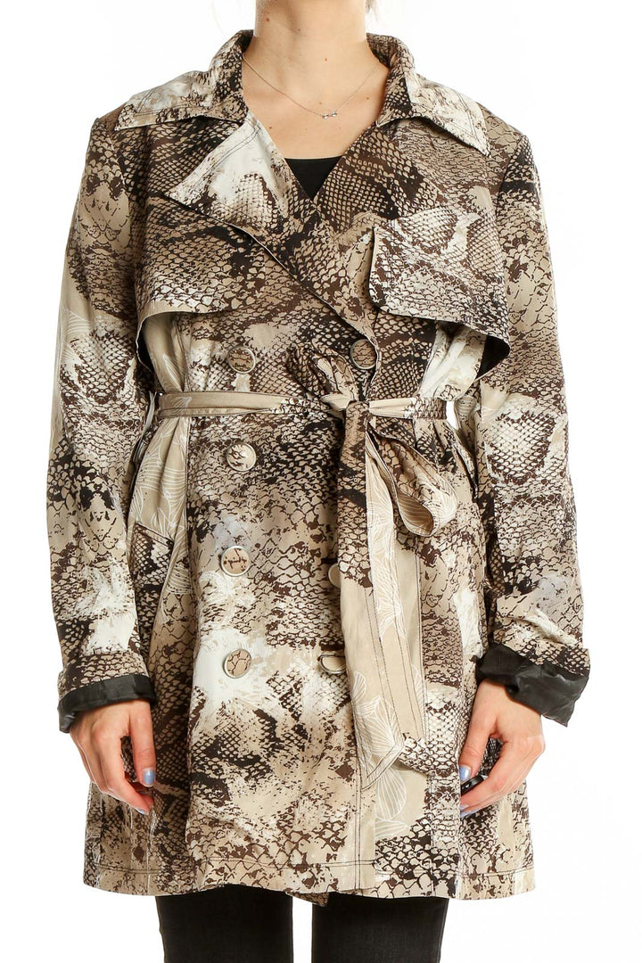 Front view of Vertigo Paris brown snake print trench coat with belt