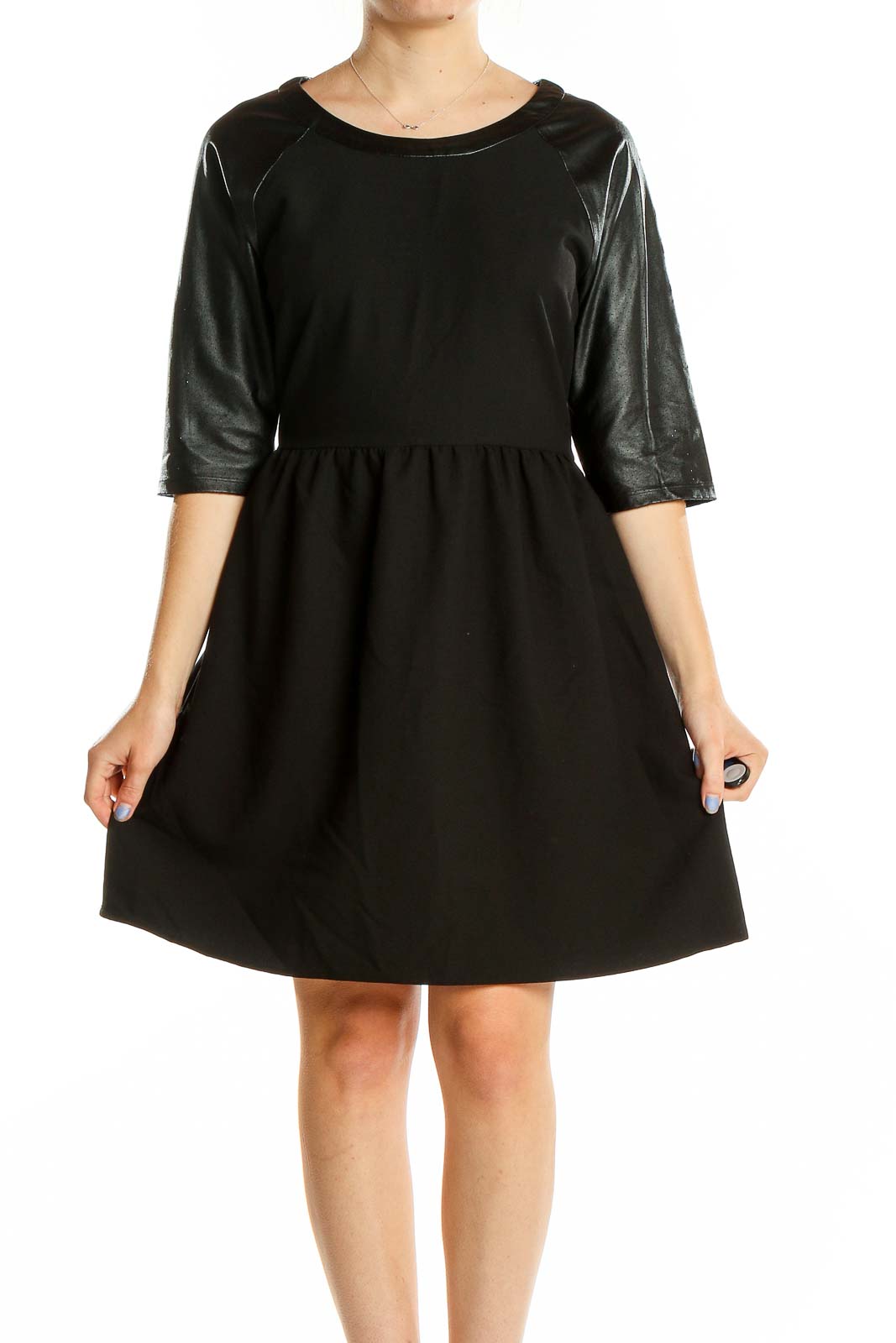 Front view of black fit and flare dress with faux leather sleeves by Romeo & Juliet Couture