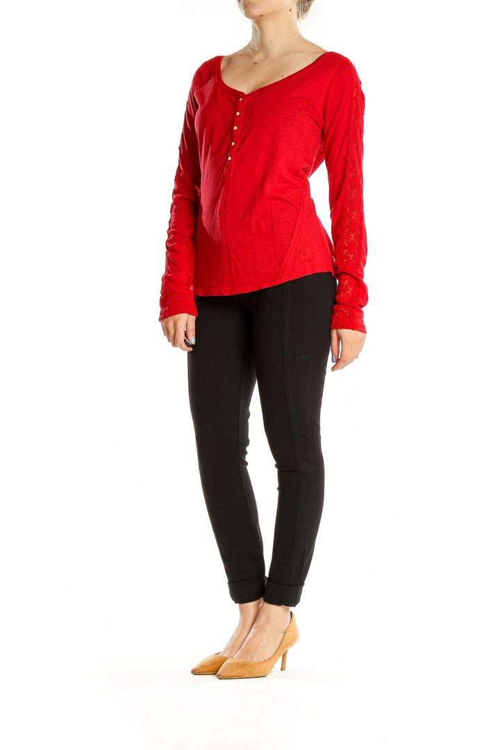 Front view of red Abercrombie & Fitch Henley top with lace sleeves