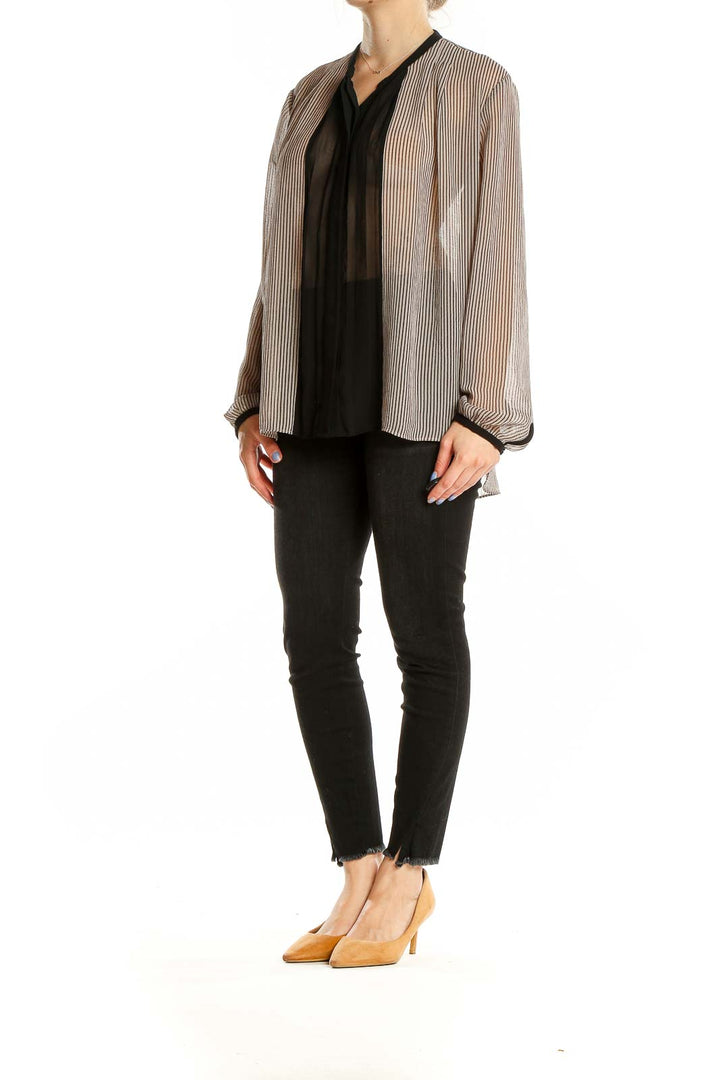 Front view of RACHEL Rachel Roy striped sheer blouse with black trim