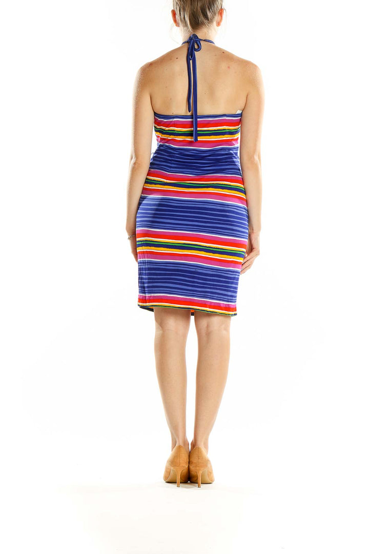 Back view of Trina Turk multicolor striped halter neck dress with tie closure