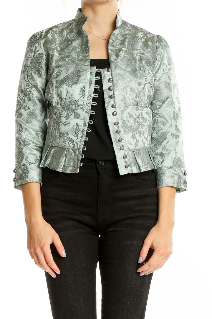 Front view of Elevenses sage green floral brocade cropped jacket