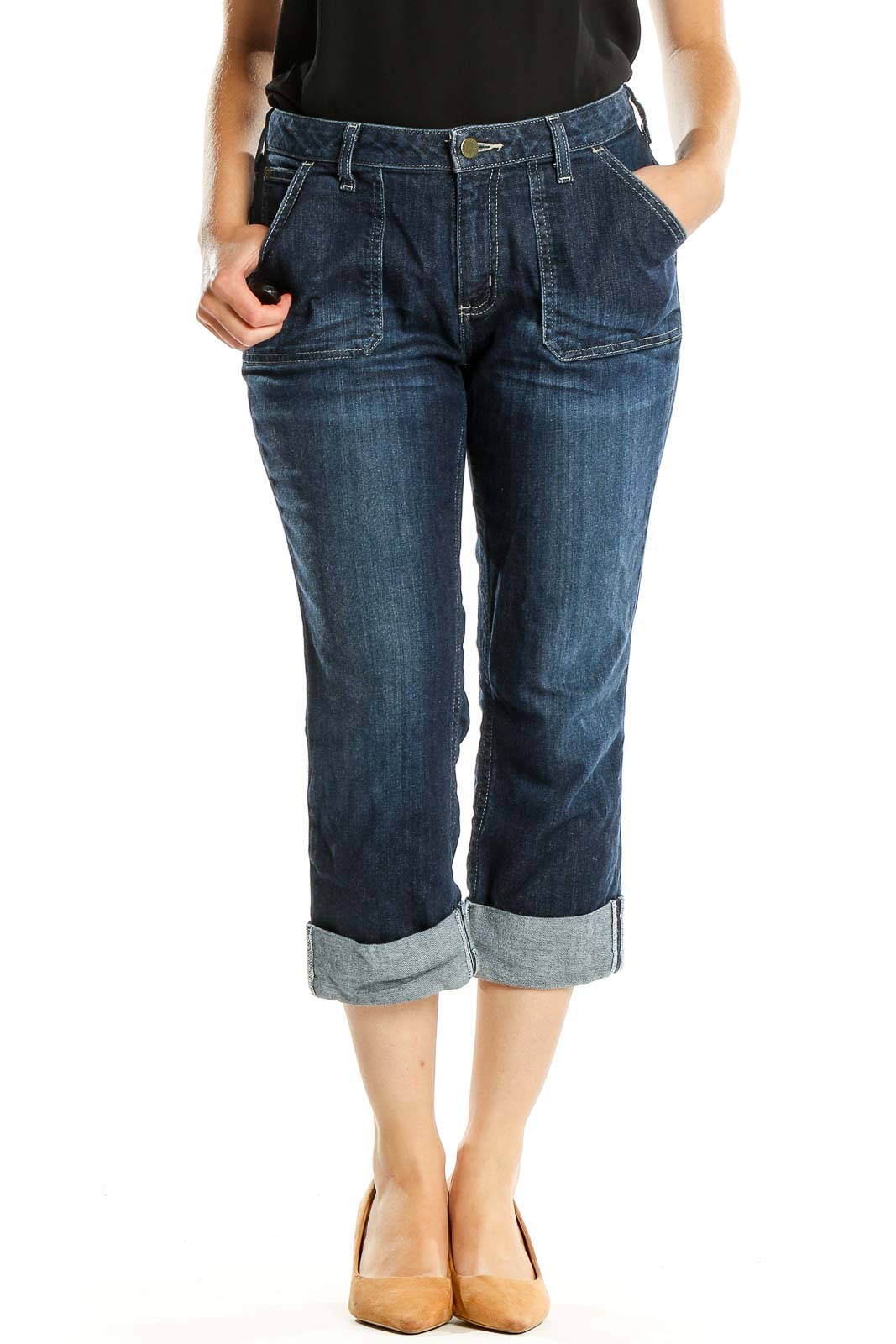 Front view of Carhartt dark blue cuffed capri jeans on model