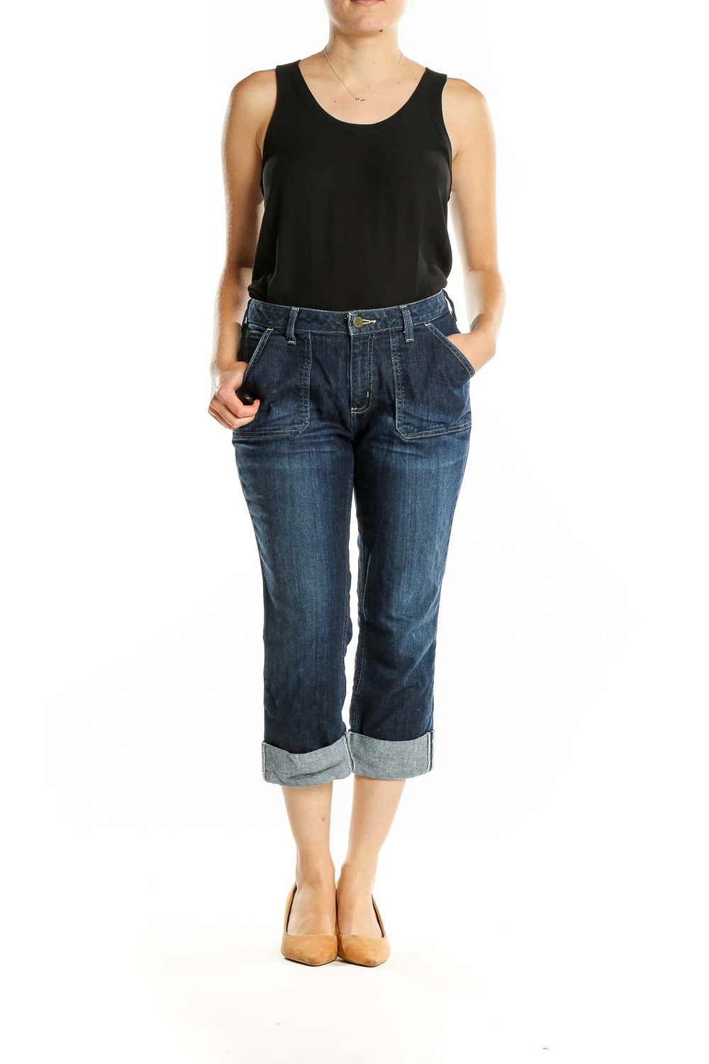 Front view of Carhartt dark blue cuffed capri jeans on model