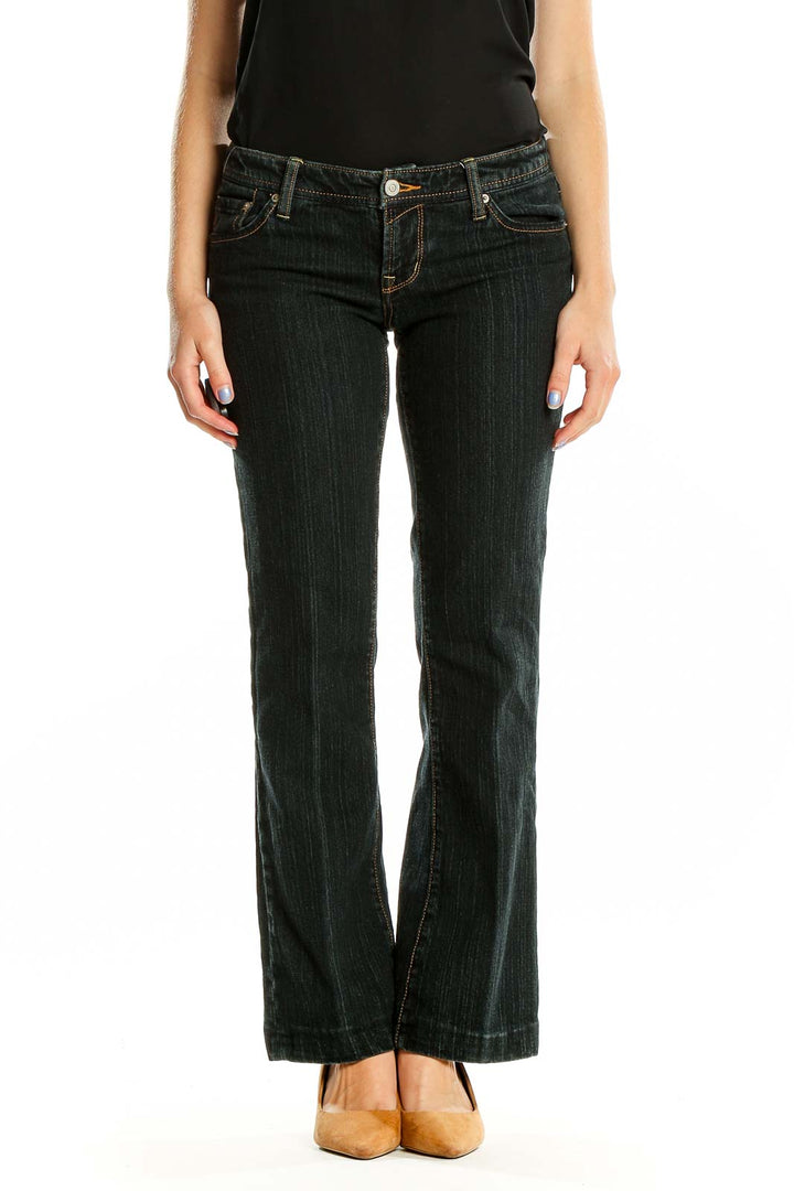 Front view of Seven7 dark blue bootcut jeans on model