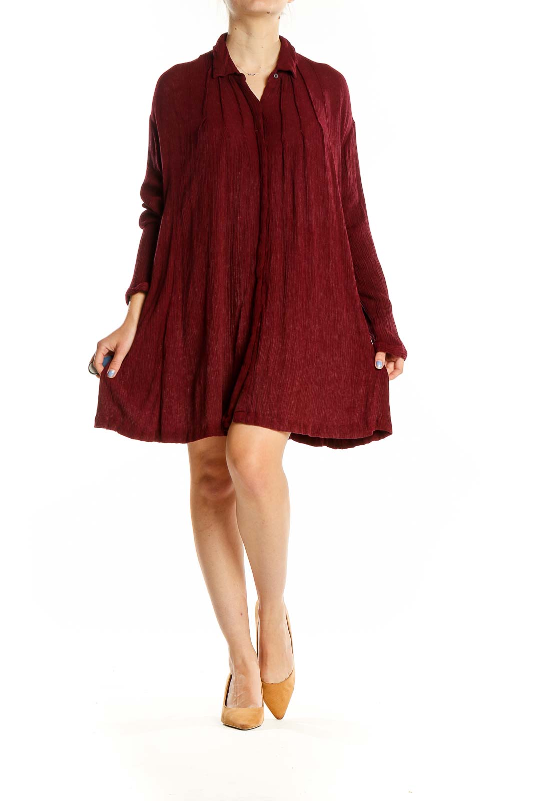 Front view of burgundy Free People flowy shirt dress with button-down front