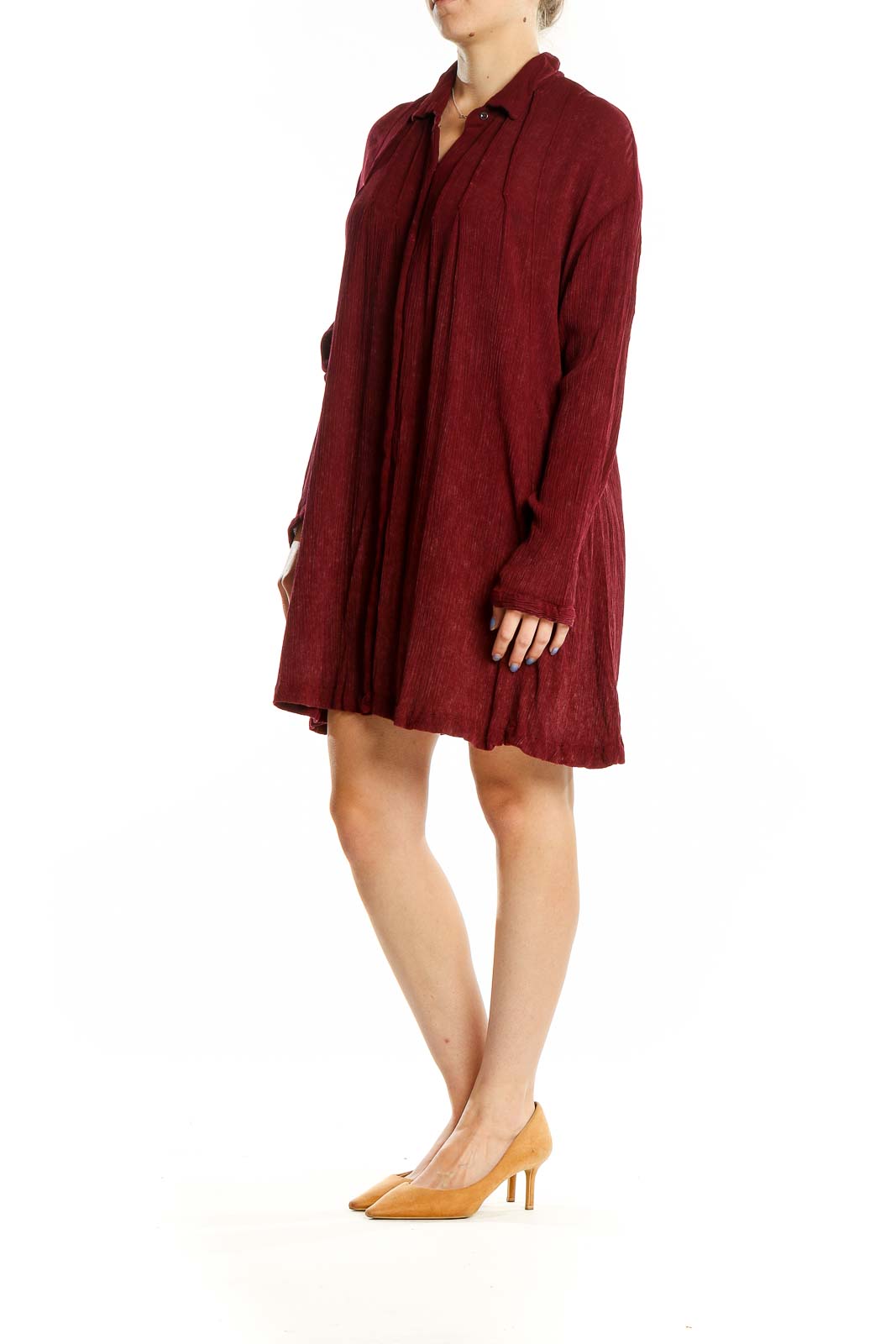 Front view of burgundy Free People flowy shirt dress with button-down front