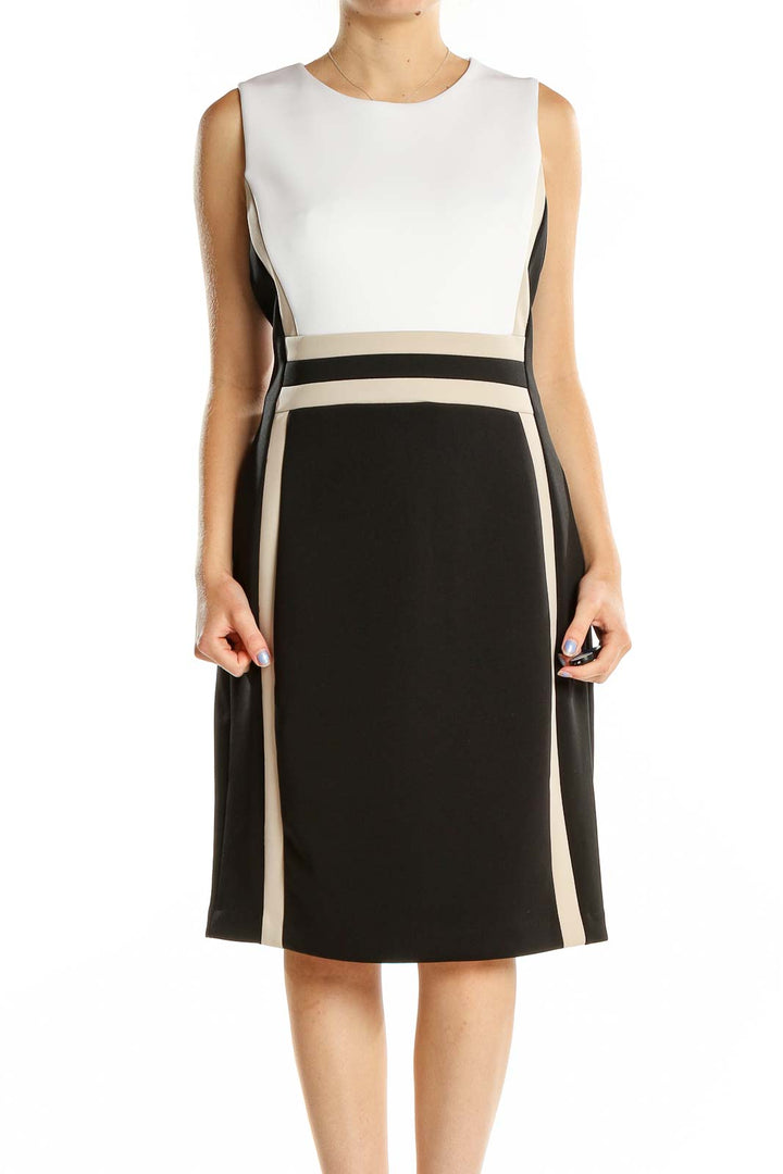 Front view of Calvin Klein black and white color block sheath dress