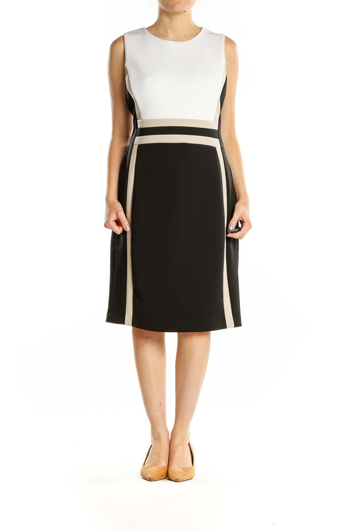 Front view of Calvin Klein black and white color block sheath dress