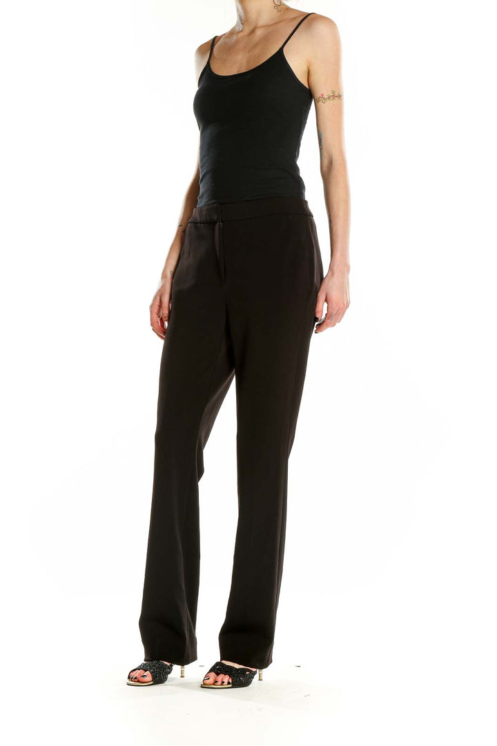 Front view of black straight-leg dress pants from White House Black Market