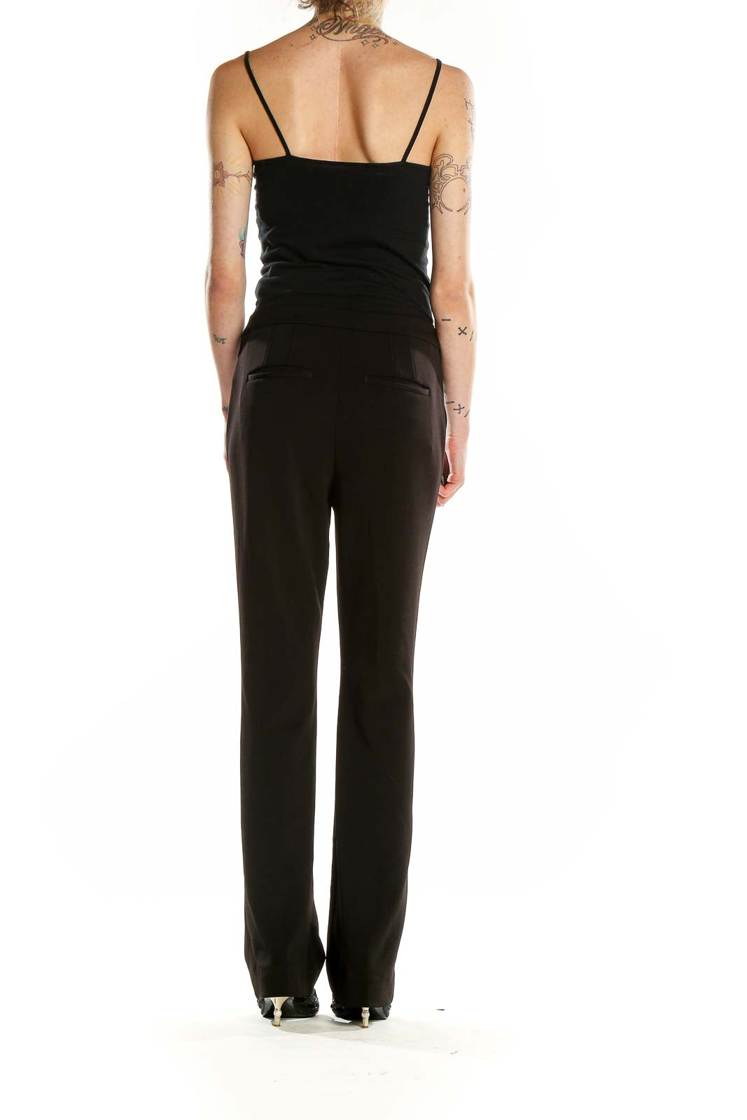 Back view of black straight-leg dress pants from White House Black Market