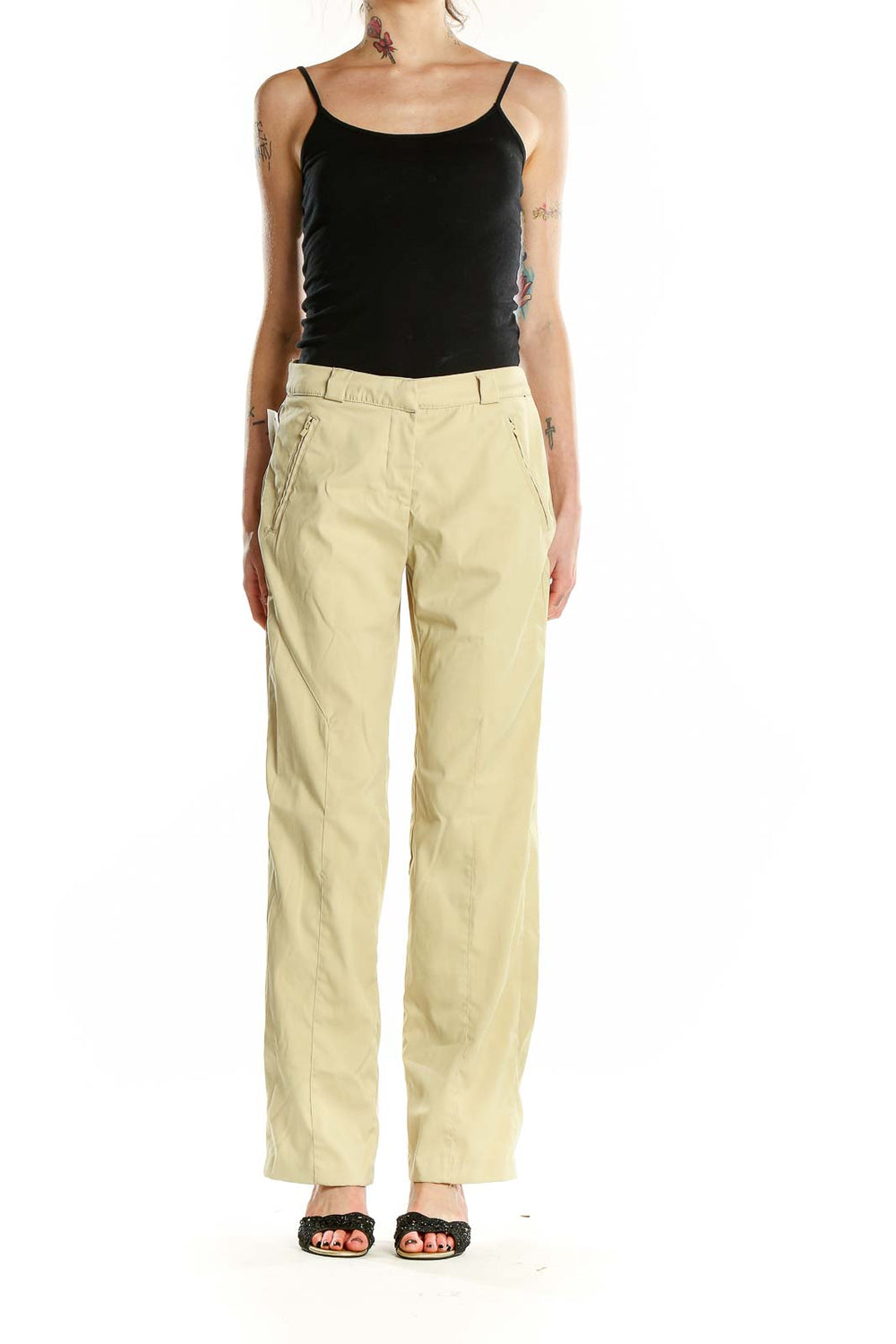 Front view of pale yellow Greg Norman activewear pants with zip pockets