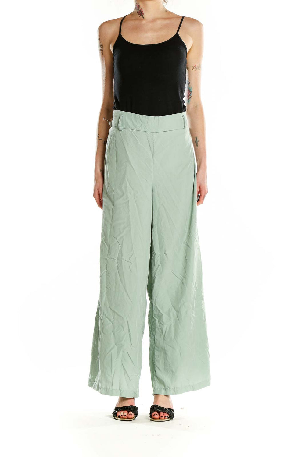 Front view of mint green wide-leg pants from LC WAIKIKI