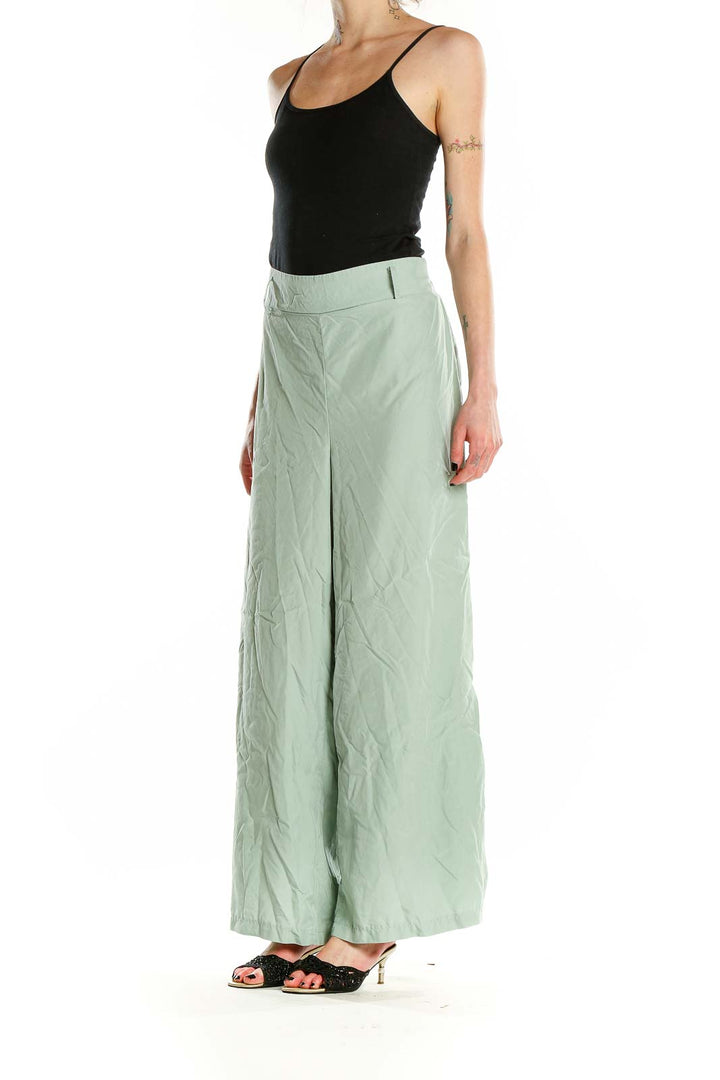 Front view of mint green wide-leg pants from LC WAIKIKI