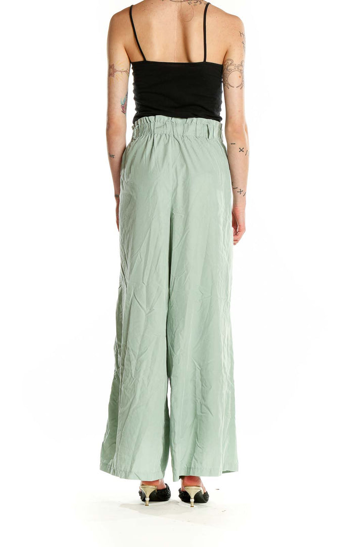 Back view of mint green wide-leg pants from LC WAIKIKI