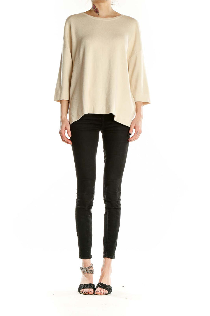 Front view of cream J.Jill relaxed fit knit sweater with 3/4 sleeves