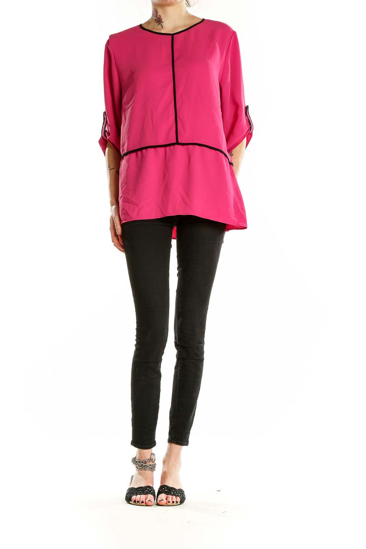 Front view of hot pink Calvin Klein blouse with layered design and black piping