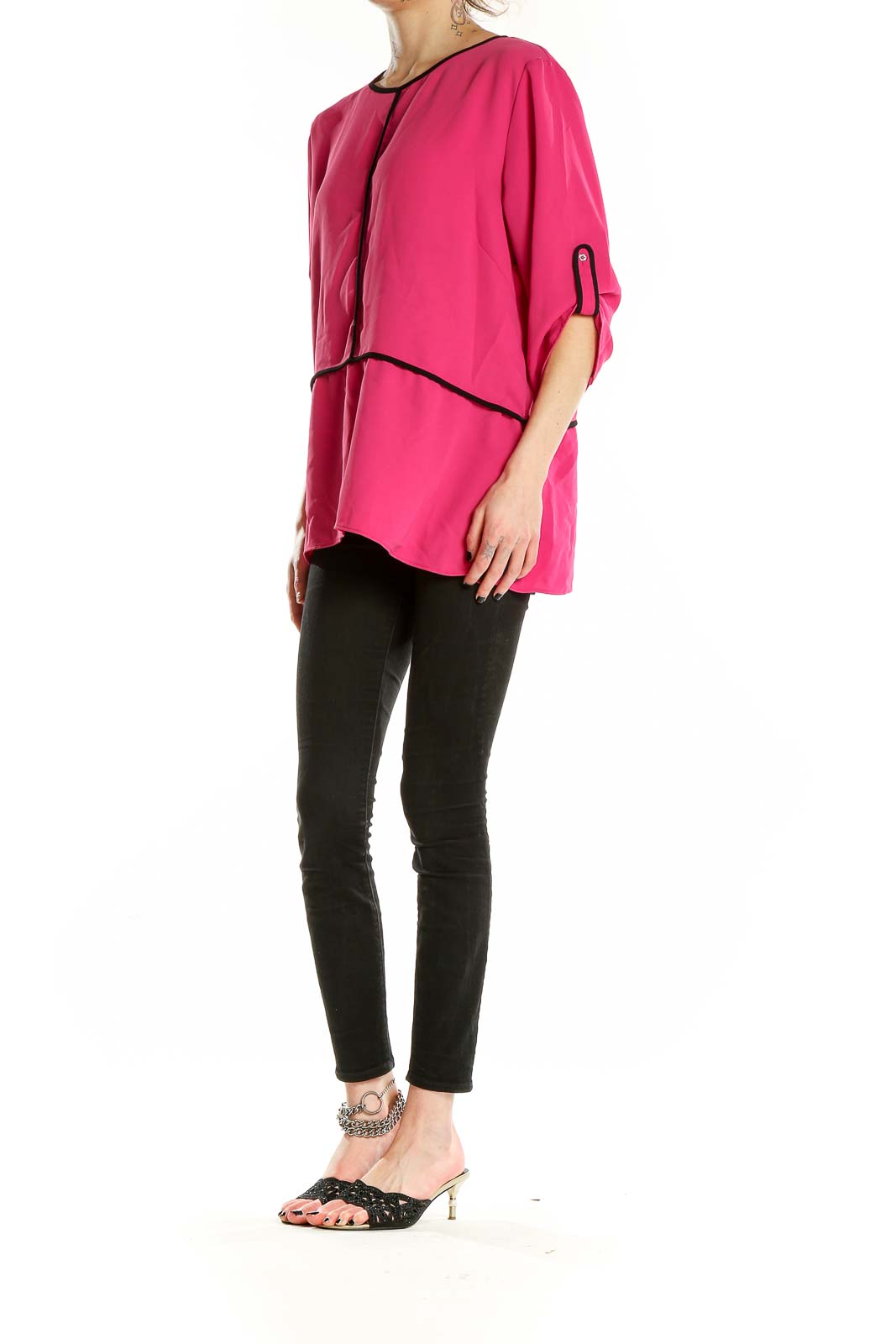 Front view of hot pink Calvin Klein blouse with layered design and black piping