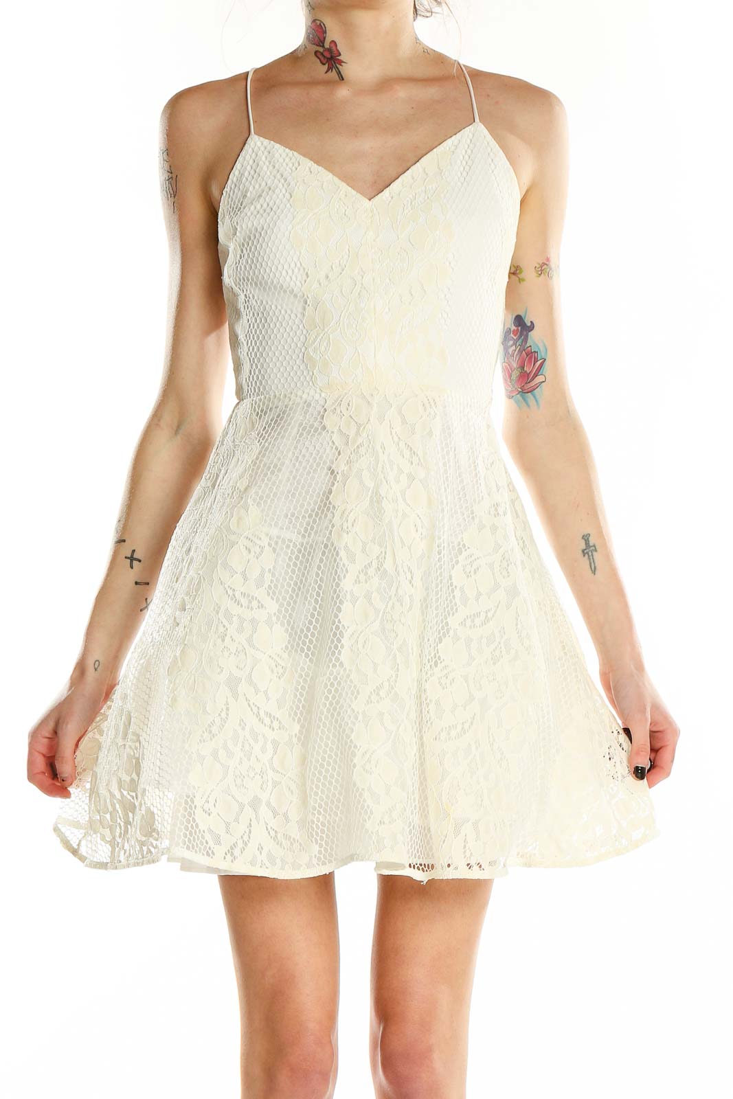 Front view of Soloiste white lace fit-and-flare mini dress with spaghetti straps