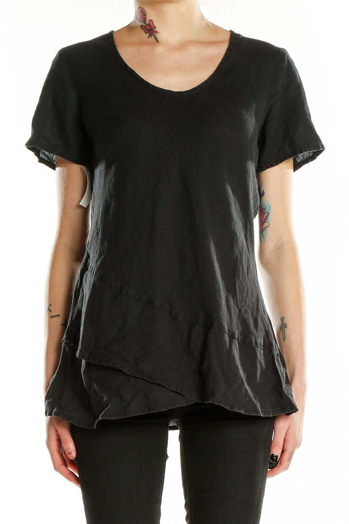 Front view of black linen short-sleeve top with layered hem by FLAX