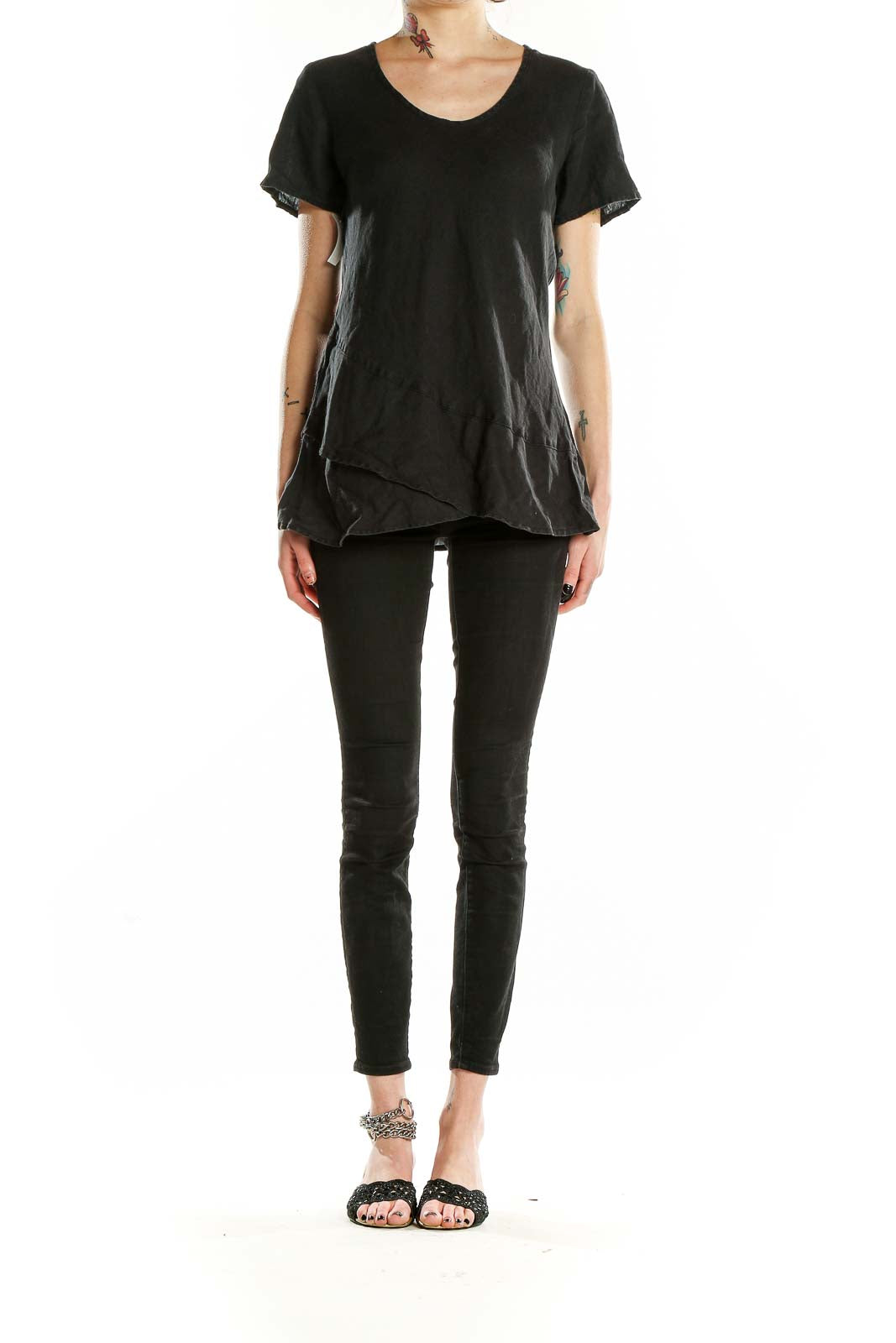 Front view of black linen short-sleeve top with layered hem by FLAX