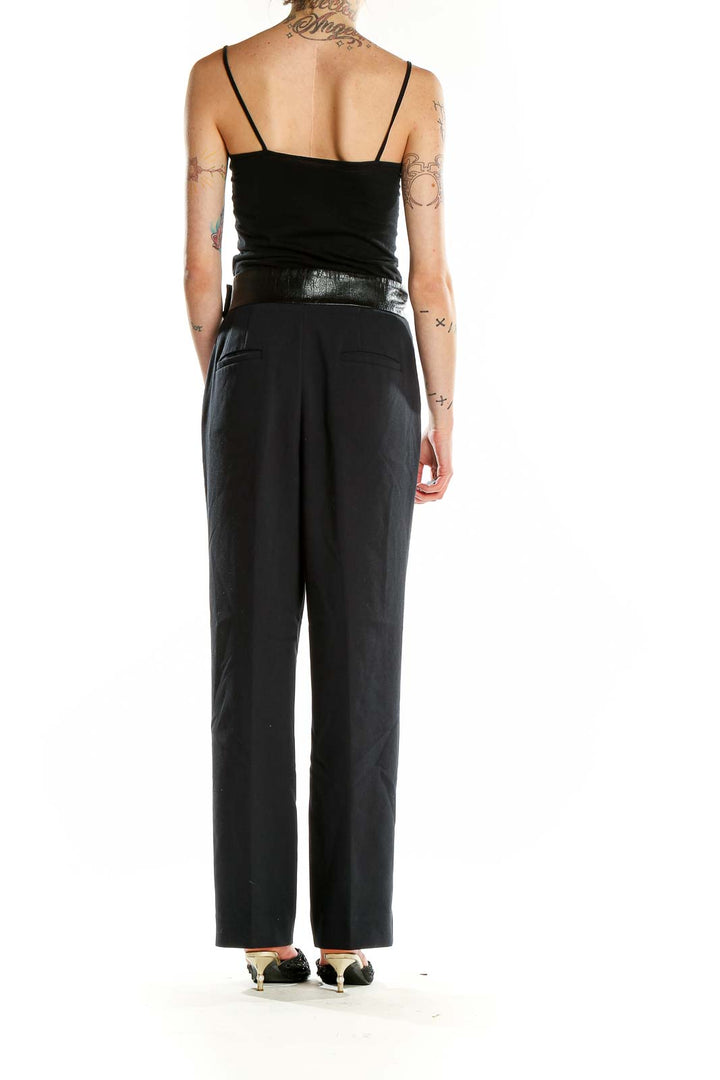 Back view of Ann Taylor black wide-leg trousers showing full length and fit