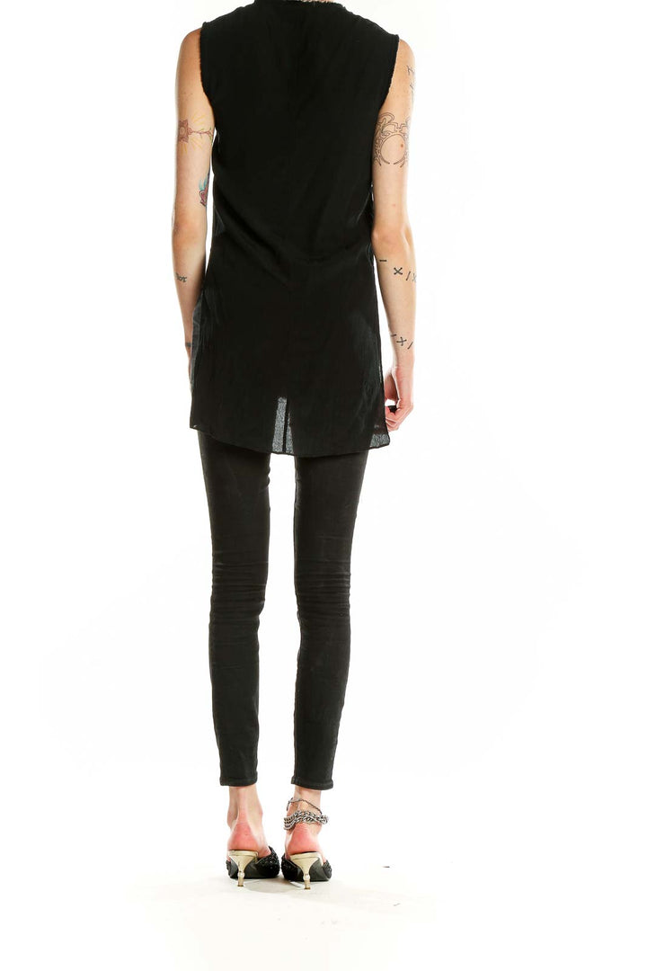 Back view of Helmut Lang black sleeveless high-low tank top showing longer hemline