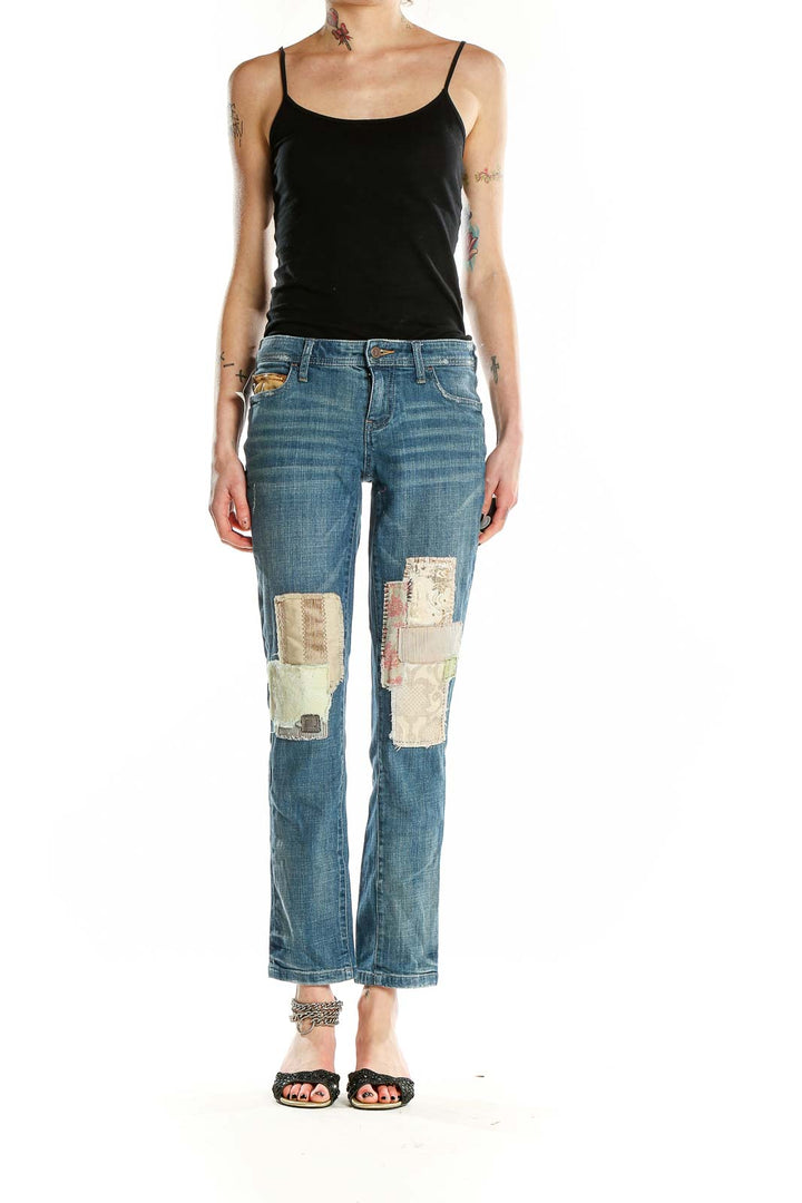 Front view of Pilcro and the Letterpress blue patchwork straight leg jeans