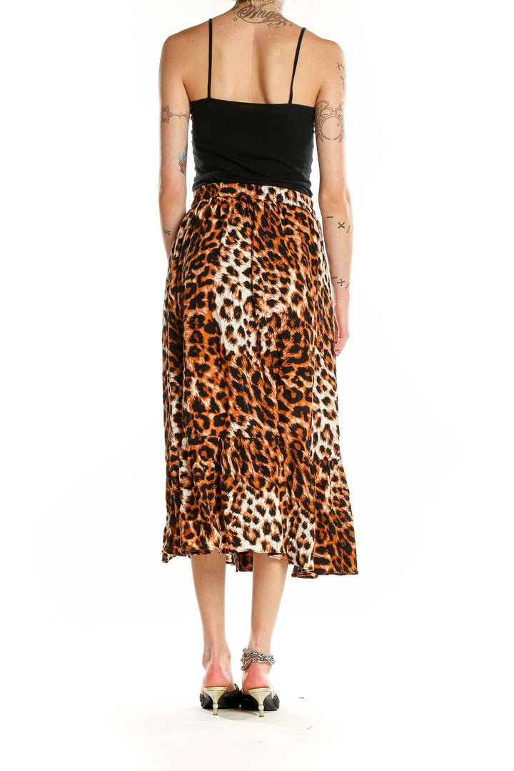 Back view of Talbots orange leopard print midi skirt showing ruffle hem detail