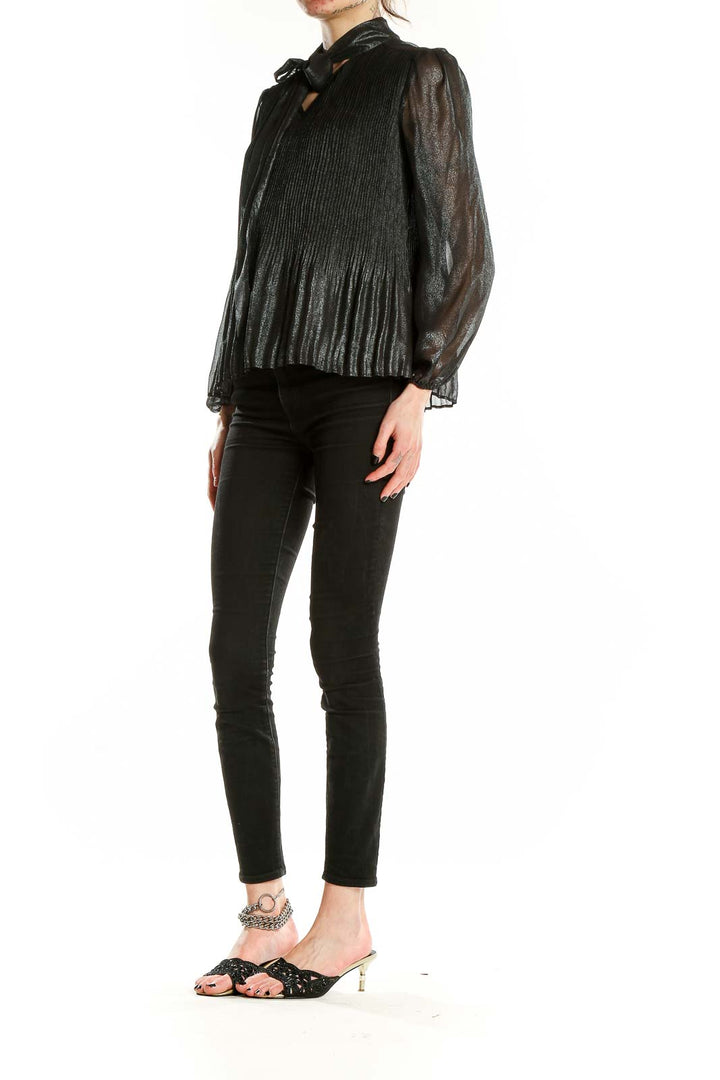 Front view of Nanette Nanette Lepore black shimmering pleated tie-neck blouse