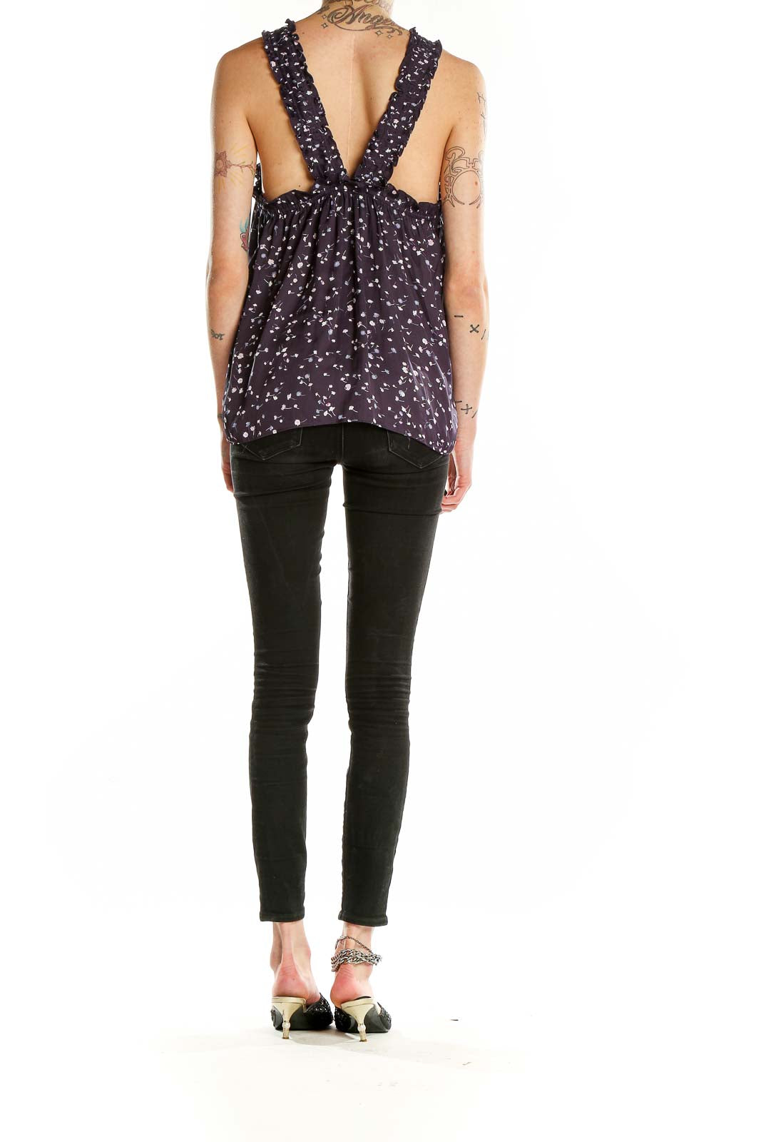 Back view of Express purple floral halter neck top showing open back design